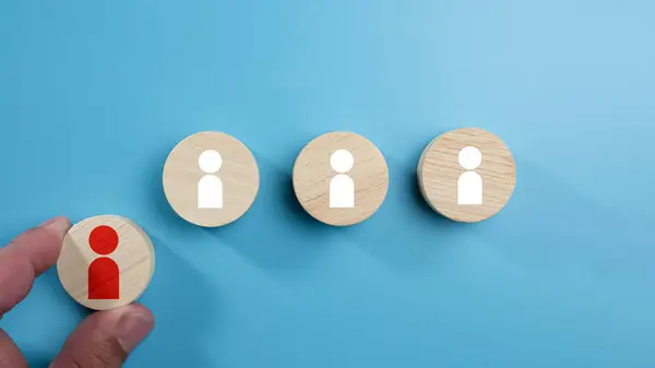 Human Resource Management, Business hiring and recruitment selection, Human Resource Management. Focus human icon on circular wooden board, Choice of employee leader crowd, leadership concept.