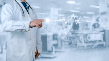 Hastanenin arka planındaki nabız grafiği, hastalıkların tedavisi konsepti, sigorta konsepti, ticari iş konsepti, sanal ekrandaki semboller ve simgeler..