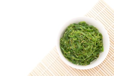 Wakame seaweed salad with sesame dressing. Traditional japanese food