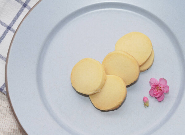 Homemade shortbread cookies on blue plate.