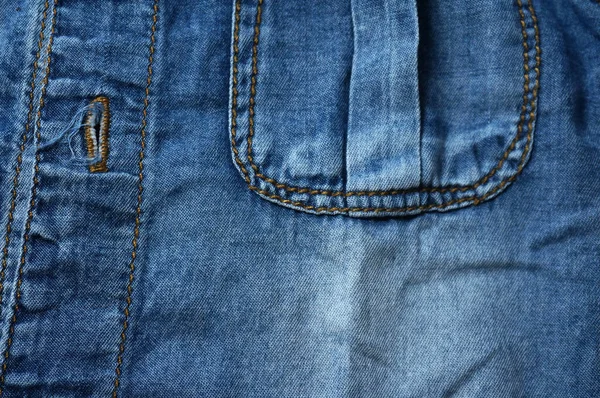 蓝色斜纹棉布牛仔裤的细节和质地背景 — 图库照片