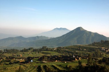 View from the merbabu mountain hiking trail. Central Java/Indonesia. clipart