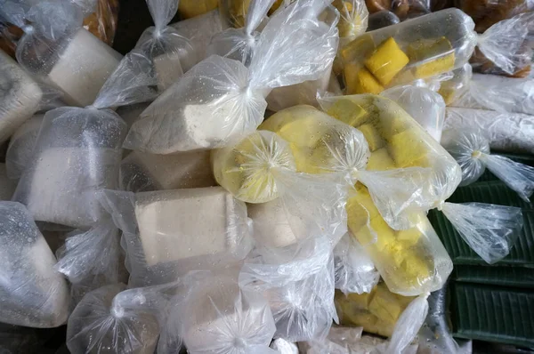 stock image white and yellow tofu being sold in the traditional market, Sangatta, East Kalimatan-indonesia.                                                