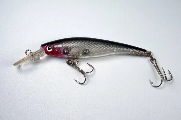Plastic fishing lure on a white background, Lure minnow