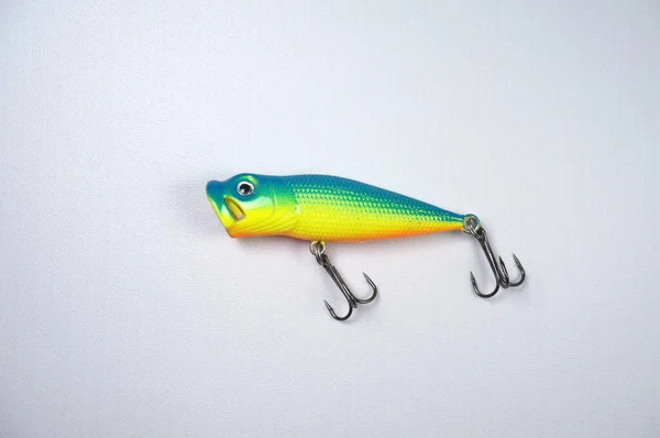 Plastic fishing lure on a white background, Lure mini popper