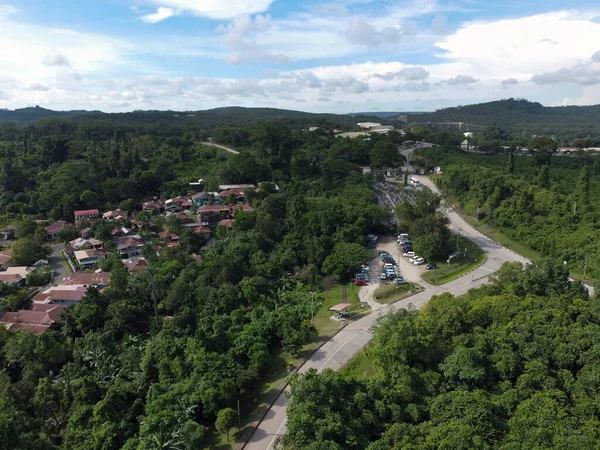 stock image Aerial View PT KPC green housing complex beside PT KPC Mining. PT Kaltim Prima Coal is the largest coal producing company in Indonesia. Location: Sangatta, East Kutai, East Kalimantan, Indonesia.