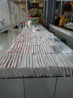 top view, tempe or tempeh in transparent plastic cover