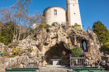Cannero, Italy - 02-05-2023: The cave of Cannero with the parish church above it