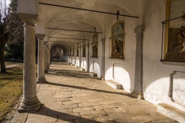 Ghiffa, Italy - 02-05-2022: the beautiful porch of the Via Crucis of the Sacro Monte of Ghiffa