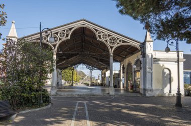 Intra, Italy - 02-05-2023: The beautiful Intra landing stage with the iron canopy