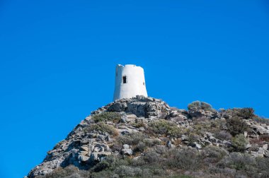 The tower of Porto Giungo in VIllasimius clipart