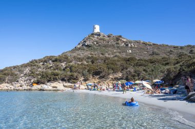 the beautiful Cala Porto Giunco beach in Villasimius with white sand and crystal clear water clipart