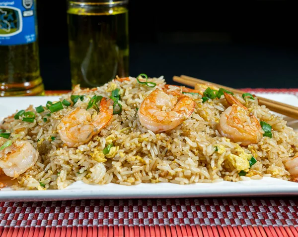 stock image rice chaufa of seafood with soda