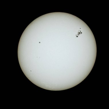 Significant sunspots on the sun during a very geomagnetically active period in 2024 with G4 solar storm activity in the forecast. clipart