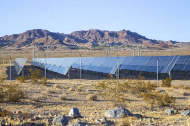 A large solar farm in the Nevada desert near the Hoover Dam and Los Vegas. clipart