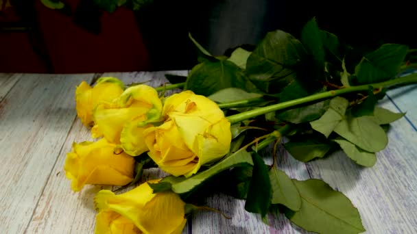 Unrecognizable Hands Fold Yellow Large Beautiful Roses Bouquet Roses Table — Stock Video