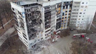 Destroyed by Russian missiles and artillery, the entrance of a residential multi-storey building in a Ukrainian city. Real war, Russian-Ukrainian war 2022-2023. Shelling of civilians. Terror of the