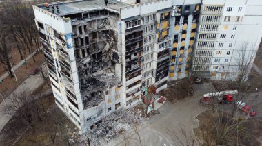 Kharkiv, Ukraine - January, 25, 2023: Destroyed by Russian missiles and artillery, the entrance of a residential multi-storey building in a Ukrainian city. Real war, Russian-Ukrainian war 2022-2023