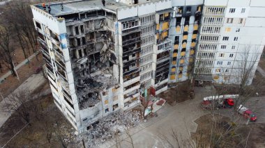Kharkiv, Ukraine - January, 25, 2023: Destroyed by Russian missiles and artillery, the entrance of a residential multi-storey building in a Ukrainian city. Real war, Russian-Ukrainian war 2022-2023