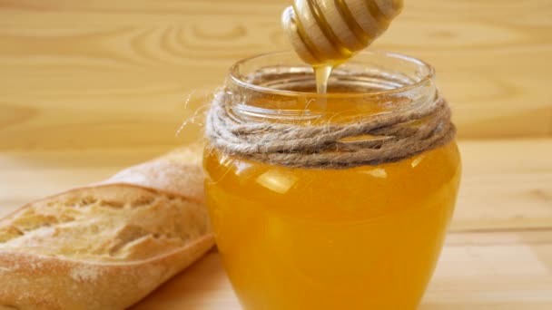 Jar Fresh Honey Bread Wooden Spoon Dipped Liquid Honey Sweet — Vídeos de Stock
