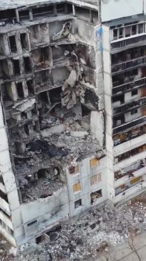 Destroyed by Russian missiles and artillery, the entrance of a residential multi-storey building in a Ukrainian city. Real war, Russian-Ukrainian war 2022-2023. Shelling of civilians. Terror of the