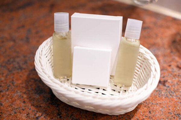Cosmetic Accessories Set in a Bathroom Basket
