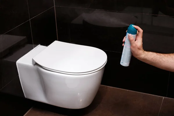 air freshener spray in the toilet