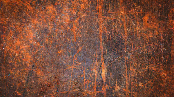The background image of the iron sheet is rusting caused by prolonged use.Close up of black rust on an old sheet of metal texture.Rust of metals.