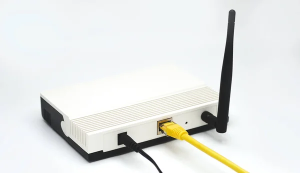 stock image LAN network and internet connection, Ethernet RJ45 cable with modem router.