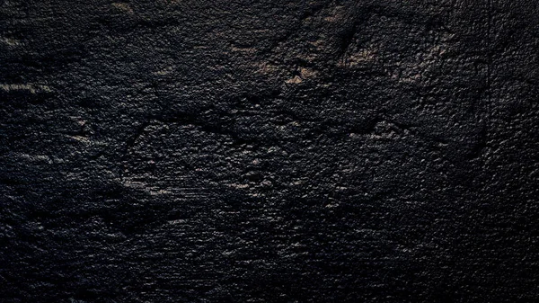 Dark grey black slate background or texture. Black granite slabs background.