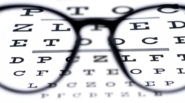 Óculos Pretos Gráfico Teste Olho Fundo Branco — Fotografia de Stock
