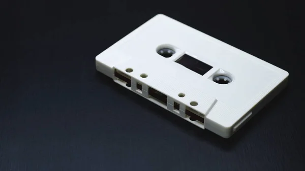 Old Audio Cassettes Dark Wooden Background — Stock Photo, Image