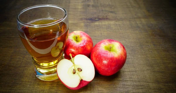 apple cider vinegar, apple juice  on  background, healthy food, drink for weight control in summer. Health care ideas for weight loss.