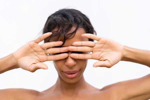 stock image Beauty portrait of young topless african american woman with bare shoulders on white background with perfect skin and natural makeup positive