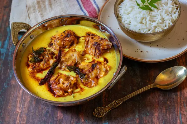 stock image Delicious Tangy Kadi Chawal: Spiced Yogurt Curry with Rice, A Comforting North Indian Traditional Meal