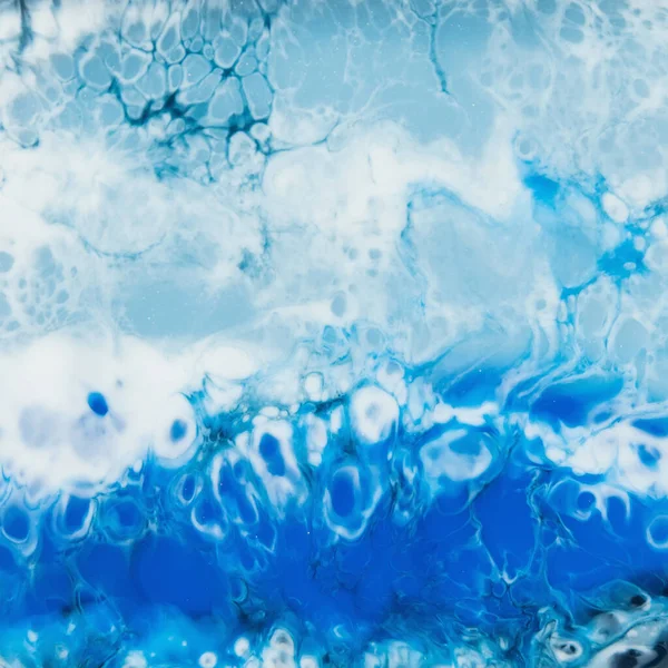 Resin art with blue colors. Epoxy effect decoration