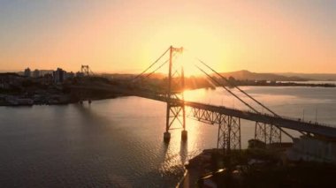 Hercilio luz cable bridge with sunset light in Florianopolis, Brazil. Aerial view