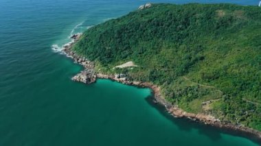 Coastline with mountain and ocean in Brazil, Barra da Lagoa beach. Aerial view