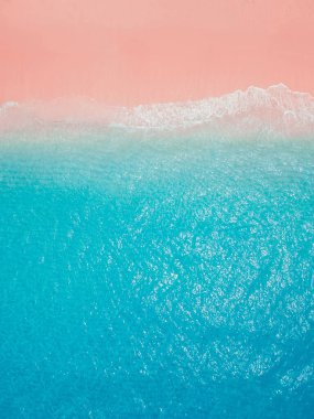 Pink beach with blue ocean. Aerial view of holidays beach on Komodo islands