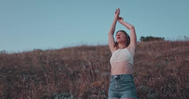 Young Woman Meditation Breathing Outdoor Sunset Tones — Video
