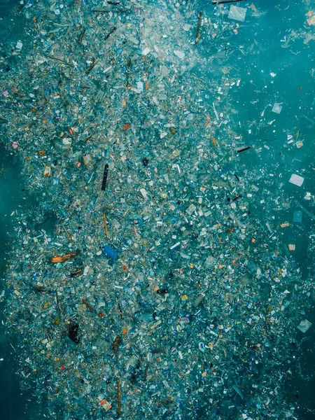 Indian ocean and plastic trash, aerial view. Pollution by plastic rubbish