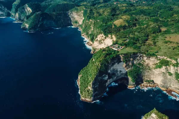 stock image Rocky coastline with scenic cliffs and ocean. Aerial view of Nusa Penida island