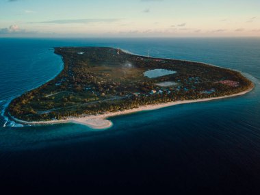 Panoramic drone view of Fuvahmulah island in Indian ocean. Aerial landscape clipart