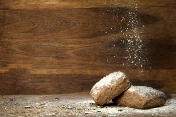 Fresh Baked Whole Grain Bread Wooden Background Falling Flour Copy — Stock Photo, Image