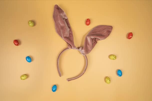 Movement Multicolour Easter Eggs Orange Background Bunny Ears Happy Easter — Stockvideo