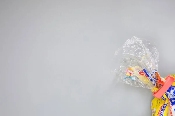 Food bag clips for keeping food fresh,plastic bag clips or Sealer on plastic bags are isolated on a gray background. Copy space, top view packaging