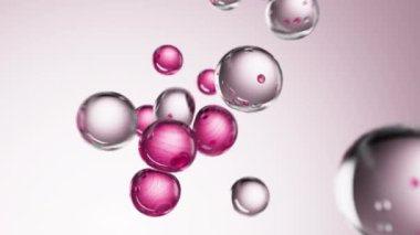 Soyut arka planda sıvı baloncuklu pembe serum. Kolajen molekülleri ile sıvı özlü jel. Cilt ve güzellik için nemlendirici krem veya yağ.