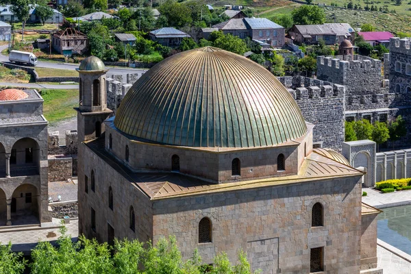 stock image Akhmediye Mosque building with golden dome in Akhaltsikhe (Rabati) Castle courtyard, medieval fortress in Akhaltsikhe with gardens and fortifications in the background.