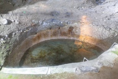Tears of Queen Tamar, Holy Spring, Holy Water pond in carved cave in Vardzia Cave Monastery complex in Georgia, believed to have healing features.
