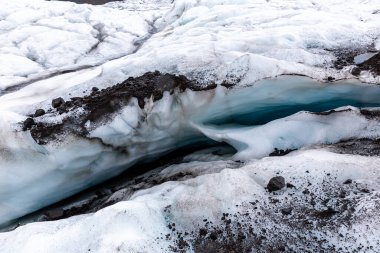 Blue crevasses in glacier ice in Skaftafell Glacier, part of Vatnajokull National Park, Iceland.